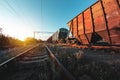 Freight train in the background of sunset - dawn is waiting for departure Royalty Free Stock Photo