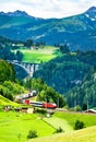 Freight train at the Brenner Railway in Austria Royalty Free Stock Photo