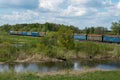 Freight train with cargo of timber, in northeastern Poland