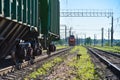 Freight train catches the wagons at the railway station Royalty Free Stock Photo