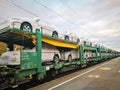 Freight train with factory-new cars Royalty Free Stock Photo