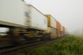 Freight Train Passes by in Fog Royalty Free Stock Photo