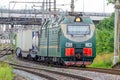 The freight train passes by the station. Wagons with goods delivery Royalty Free Stock Photo