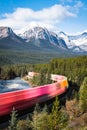 Freight train passing through Morants Curve in slow motion Royalty Free Stock Photo