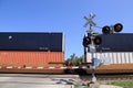 Freight Train at railroad crossing Royalty Free Stock Photo