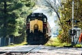 Passenger Train at railroad crossing. Royalty Free Stock Photo