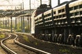 Freight train on rails. Wagons with delivery of ore, crushed stone, coal by railway Royalty Free Stock Photo