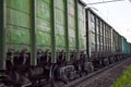Freight train, railway wagons with motion blur effect. Transportation, railroad. Royalty Free Stock Photo