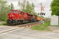 Freight Train at Road Crossing