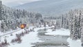 Freight Train rumbles around the Morant`s Curve along the Bow River near Lake Louise