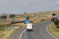 Freight train on Shap and lorries on M6 motorway