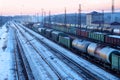 Freight train with tanks moves on railways