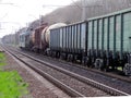 Freight train with wagons and tanks Royalty Free Stock Photo