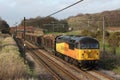 Freight train on West Coast mainline in Lancashire Royalty Free Stock Photo