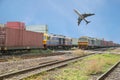 Freight trains in dock with airplane for logistics background