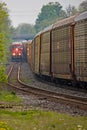 Freight Trains Meet On Narrow Tracks Royalty Free Stock Photo