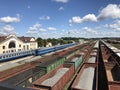 Freight trains at the railway station. Open freight wagons with cargo