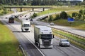 Freight Transport Trucks in Motorway Traffic Royalty Free Stock Photo