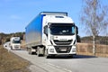 Freight Transport by Two White Semi Trucks Royalty Free Stock Photo