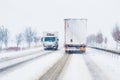 Freight transportation truck on the road in snow storm blizzard Royalty Free Stock Photo