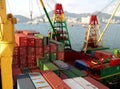Freight vessel loading unloading in port terminal. Container ship with cranes in dock. Royalty Free Stock Photo