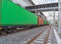 Freight wagons. Container cargo ship in the export and import business and logistics on train on railway. International goods in Royalty Free Stock Photo