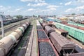 Freight wagons in a depot in the foreground wagons loaded with coal