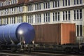 Freight wagons train on railway tracks. Close-up of freight trains Royalty Free Stock Photo