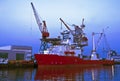 Freighter in Rotterdam harbor at night in Holland