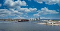 Freighter and Tugboat Leaving Harbor Royalty Free Stock Photo