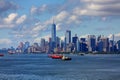 Freighters in Harbor with New York City in Background Royalty Free Stock Photo