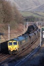 Freightliner 66 diesel locomotive with coal train.