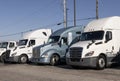 Freightliner and Kenworth Semi Tractor Trailer Big Rig Trucks lined up for sale