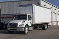 Freightliner Semi Tractor Trailer Big Rig Trucks lined up for sale. Freightliner is owned by Daimler Trucks