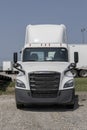 Freightliner Semi Tractor Trailer Trucks lined up for sale. Freightliner is owned by Daimler Trucks