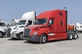 Freightliner Semi Tractor Trailer Trucks lined up for sale. Freightliner is owned by Daimler Trucks