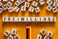 Freiwilliage - word Volunteer on german language,word concept