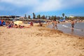 FREJUS, FRANCE - AUG 16, 2016: Beach scene with holiday makers on vacation enjoying sand and sea.