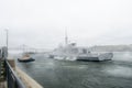 FREMM Languedoc & Svitzer Cartier tugboat Royalty Free Stock Photo