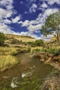 Fremont River winding through a red rock canyon, Capitol Reef National Park, Utah, USA Royalty Free Stock Photo