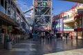 Fremont Street Experience with restaurants and retail stores, people walking in downtown Las Vegas Nevada