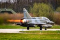 French Air Force Dassault Mirage 2000 fighter jet plane afterburner take-off from Leeuwarden Airbase. April 11, 2019 Royalty Free Stock Photo