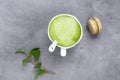 French almond cake makarons, green leaf, matcha tea