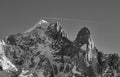 French Alps. Rocky mountain peaks and a plane trail