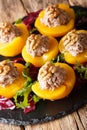 French appetizer peaches stuffed with tuna mousse and decorated