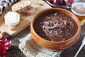 French authentic cuisine. Red onion beer soup with bread and goat cheese Royalty Free Stock Photo