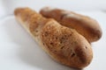 French baguette close up on a white background