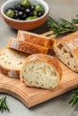 french baguette. Italian ciabatta bread on a wooden board. kitchen or bakery. banner, menu, recipe place for text, top view