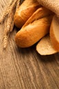 French baguette sliced on the wooden desk Royalty Free Stock Photo