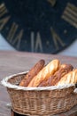 French baguettes in a wicker basket with empty space for text Royalty Free Stock Photo